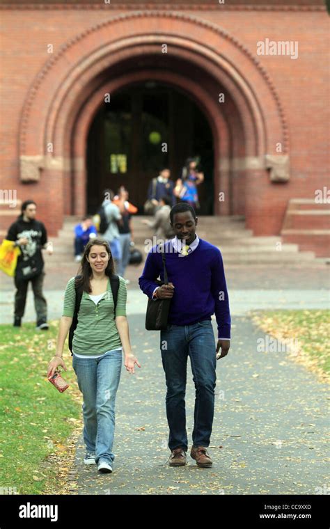 Harvard University students walk in Harvard Yard after attending class ...