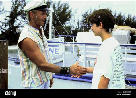 PAUL HOGAN, ELIJAH WOOD, FLIPPER, 1996 Stock Photo - Alamy