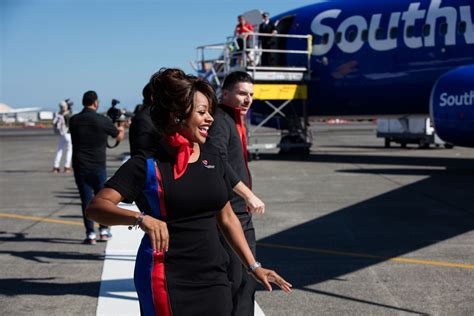 See Southwest Airlines employees show off their new uniforms at 35,000 feet