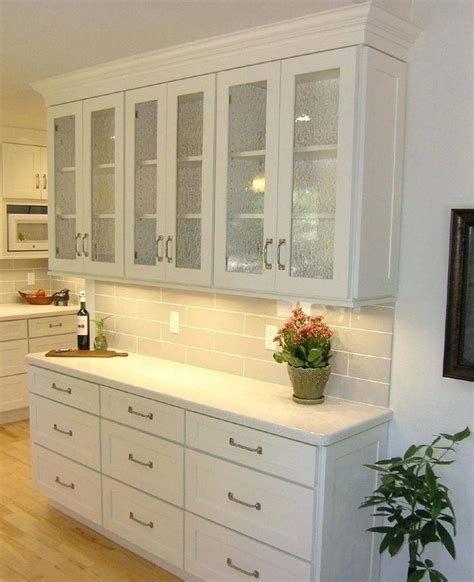 build a dry bar shallow buffet built of white shaker cabinets with textured glass doors and sash ...