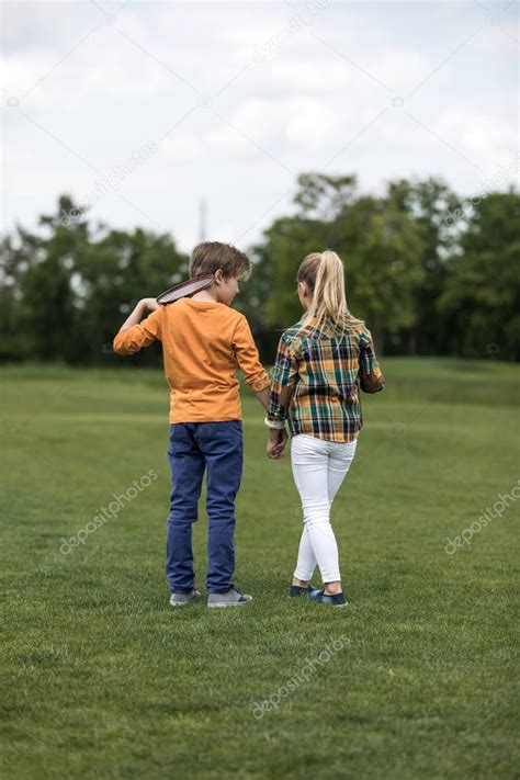 Friends holding hands — Free Stock Photo © IgorVetushko #157668216