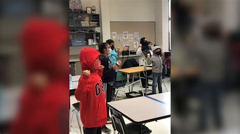 The unique way one Winnipeg school is performing O Canada each day ...