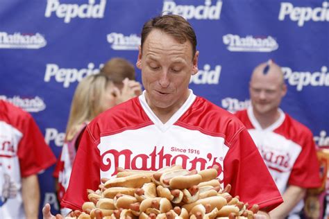 Joey Chestnut wins record 16th Nathan’s hot dog eating contest after weather delay - UPI.com