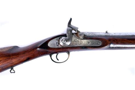 An India issue Lee Enfield percussion cap rifle, serial 1143, also with ...