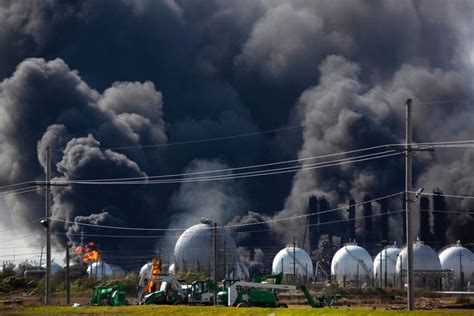 More than 50,000 people in Texas remain under mandatory evacuation as a massive fire continues ...