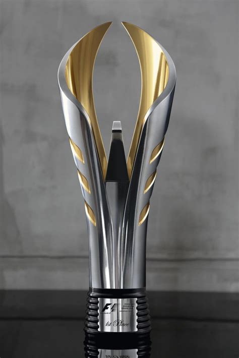 LOOK Behind SIA's F1 trophy design | Trophy design, Glass design, Trophy