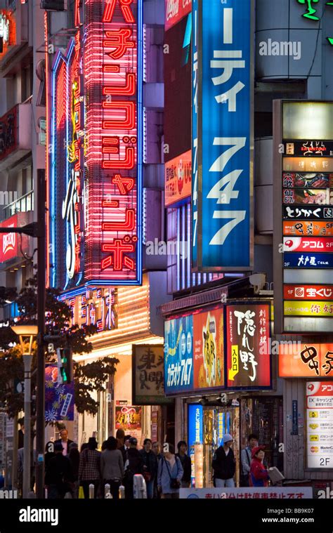 Neon signs at dusk in the Kabukicho area Shinjuku district Tokyo Japan ...