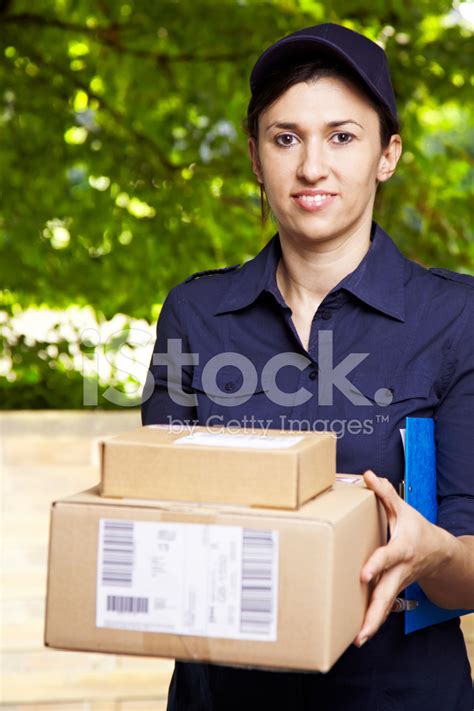 Delivery Worker Delivers Packages Stock Photo | Royalty-Free | FreeImages