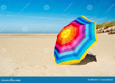 Parasol at the beach stock photo. Image of texel, sunshine - 38997372