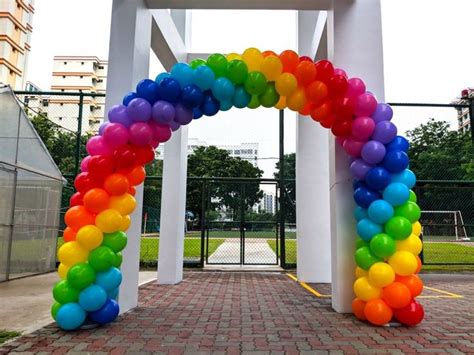 Balloon Decorations for Woodlands Ring Primary School | That Balloons | Rainbow balloon arch ...