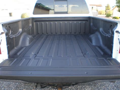 DIY bedliner installed - Nissan Titan Forum