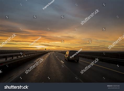 Car On The Sunset Road. Stock Photo 408095485 : Shutterstock