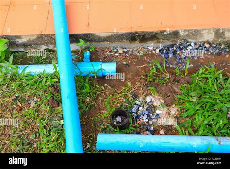 PVC plastic pipe repair cut outside a building site Stock Photo - Alamy