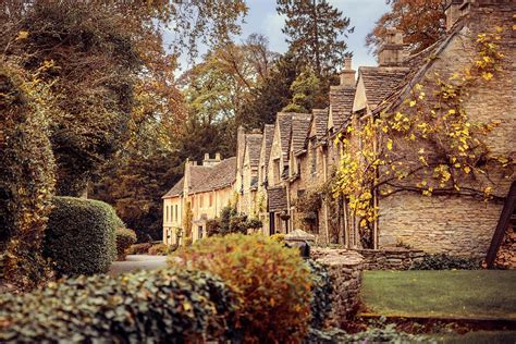 Castle Combe Village Photograph by Svetlana Sewell - Pixels