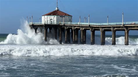 Closed Pier, flooded Polliwog, huge waves: Manhattan Beach in-between rain