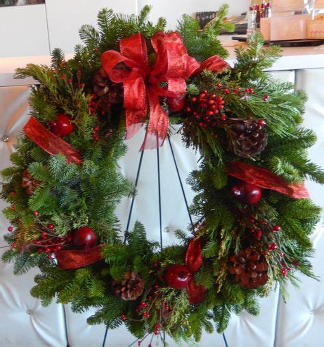 One of many examples of cemetery wreaths made by Dizennio Floral. Here is a wreath p ...