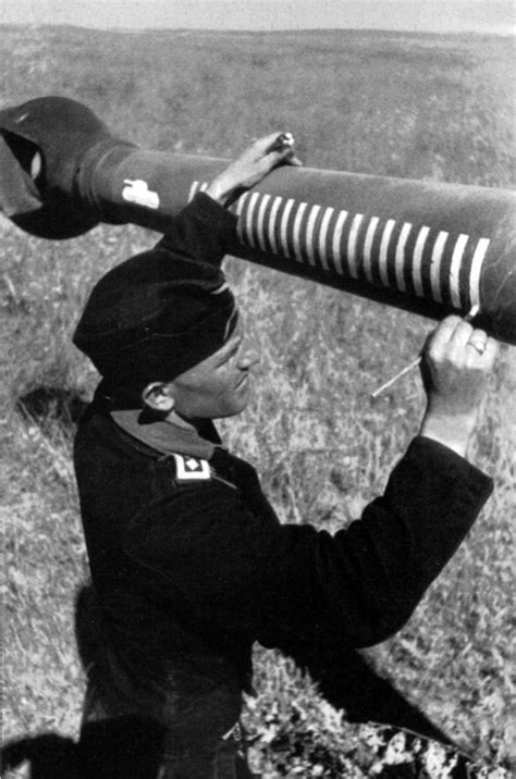 Crewmember of a Sturer Emil Tank Destroyer marks another kill on the vehicle’s 12.8cm gun ...