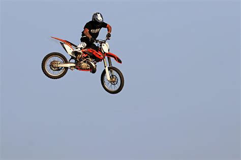 Dirt Bike Stunts - In The Air III Photograph by Debbie Oppermann - Fine Art America