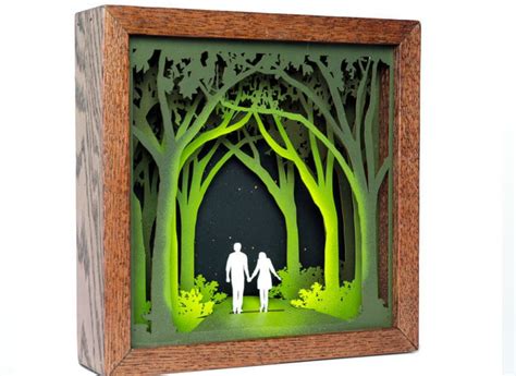 Artist creates intricate shadowboxes out of laser cut wood pieces