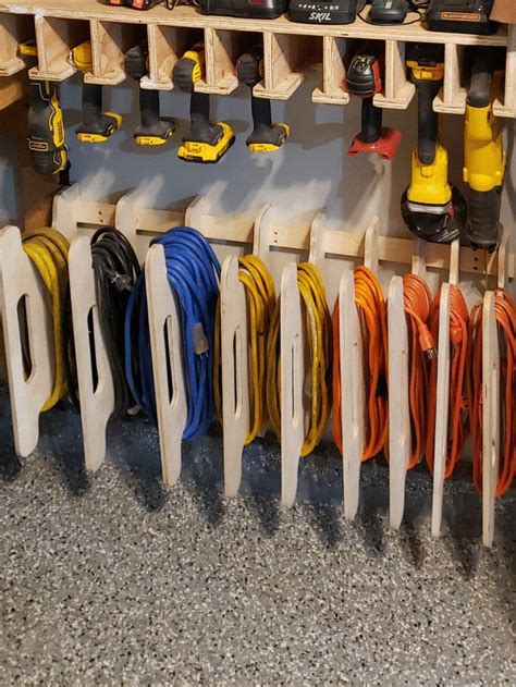 French cleat extension cord holders | Garage storage inspiration, Garage workshop organization ...