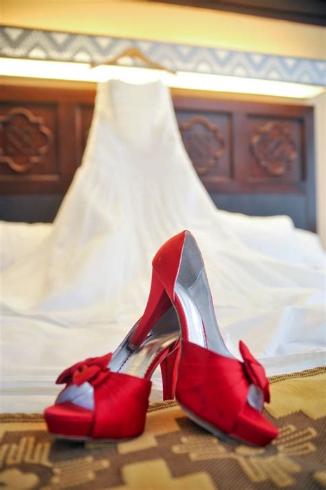 There's nothing like a pair of bright red heels to add more personality to a beautiful wedding ...