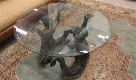 Lot - ROUND GLASS-TOP FIGURAL BRONZE COCKTAIL TABLE