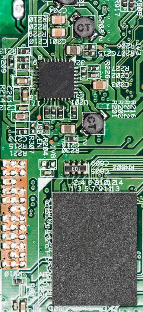 Premium Photo | Pcb with different components closeup shot