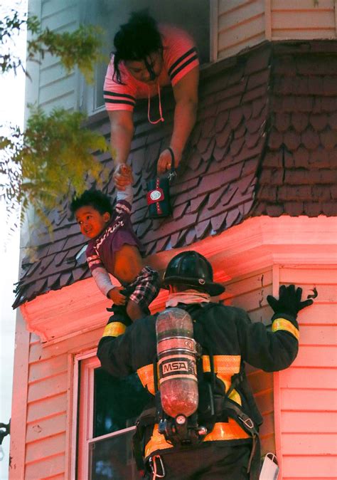 See: Firefighter saves child, mother in dramatic fire rescue – Boston ...