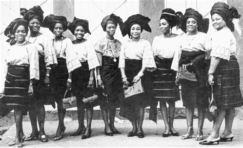 Vintage 1960s photograph of chic women in Lagos dressed in Yoruba traditionai Ìró, Bùbá, and ...