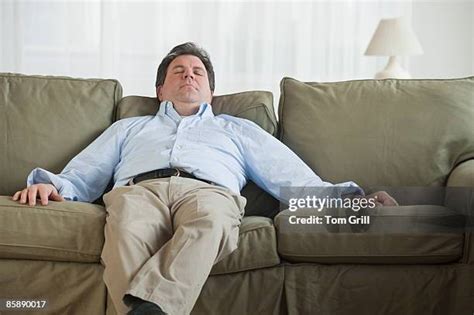 78 Fat Man Sleeping On Couch Stock Photos, High-Res Pictures, and Images - Getty Images