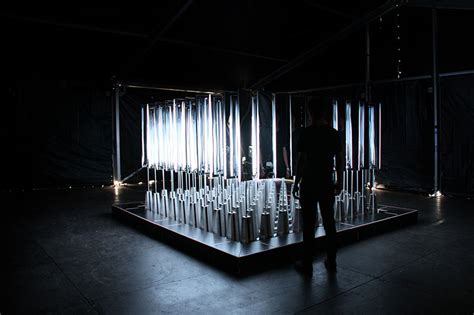 SOFTlab's interactive light installation uses 100 mirrored panels that rotate individually