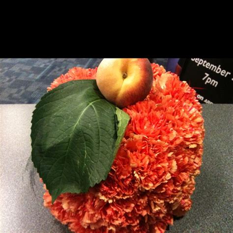 A peach arrangement made from carnations | Food, Peach, Fruit