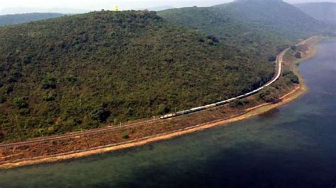 Indian Railways stunning photos birds eye view train Chilka Lake water ...