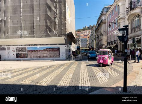 Vintage car driving on the road Stock Photo - Alamy