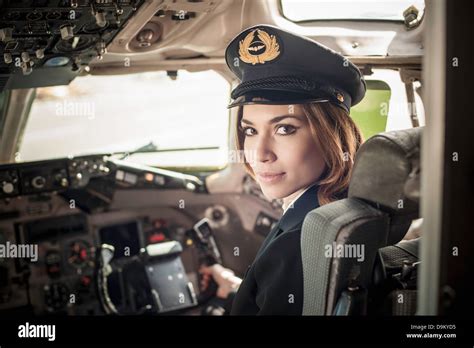 Female pilot in aeroplane cockpit Stock Photo - Alamy