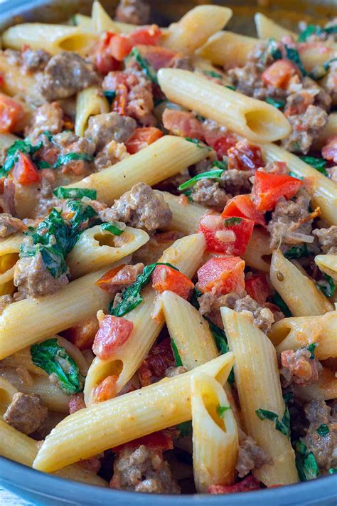 Creamy Italian Sausage and Tomato Pasta | Foodtasia