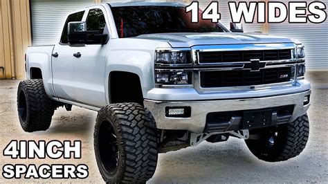 4 INCH SPACERS AND 14 WIDES!! Lifted Trucks - Squatted Trucks - YouTube