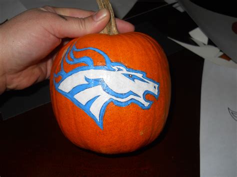 Painted Broncos pumpkin. Just trace or free hand the logo then paint it ...