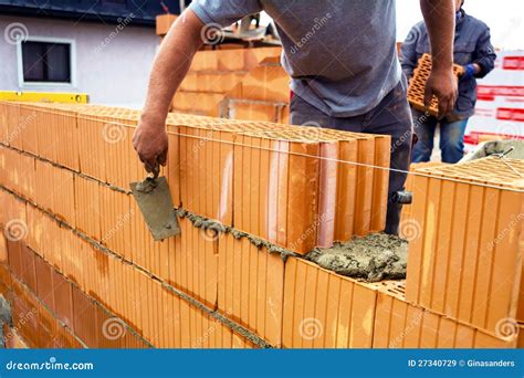 Mason with Brick on Construction Site Stock Image - Image of ...