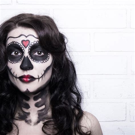 Premium Photo | Halloween concept woman with creative skull make up ...