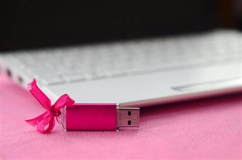 Premium Photo | Close-up of usb stick and laptop on table