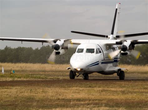 Commuter plane on taxiway stock image. Image of transportation - 6405173