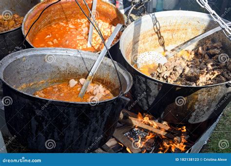 Very Large Cauldron Cooking Food during Campfire. Cooking in a Pot on ...