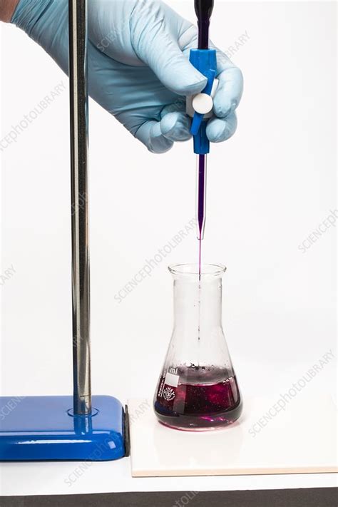 Titration of potassium manganate (VII) - Stock Image - C030/3774 ...