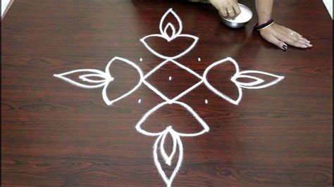 Easy rangoli designs for diwali with 7 to 1 dots- deepam kolam designs - muggulu designs
