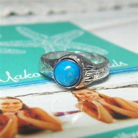 Mermaid moonstone ring Naree | Mako mermaids, Moon ring, Mermaid ring