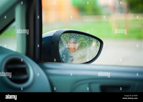 closeup of car mirror and rain drops Stock Photo - Alamy