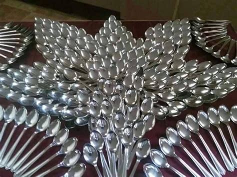 Flower created with spoons | Spoon art, Entertaining table settings ...