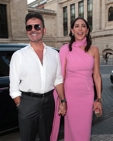 Simon Cowell and Girlfriend Lauren Silverman Pack on the PDA