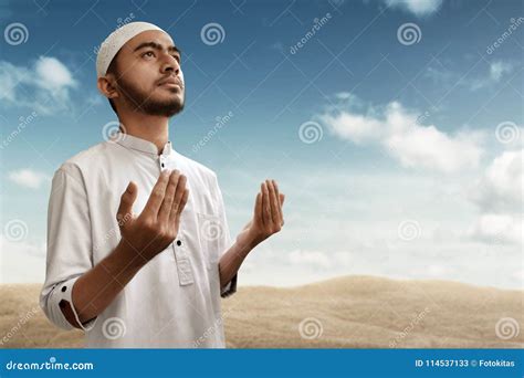 Muslim man pray on desert stock image. Image of culture - 114537133